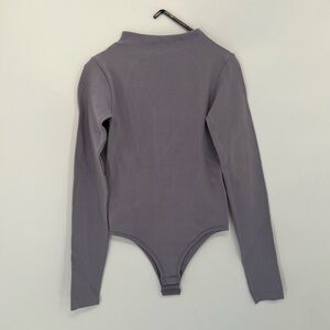 Zara Limitless Contour High Neck Long Sleeve Back Cut Out Bodysuit In Lavender